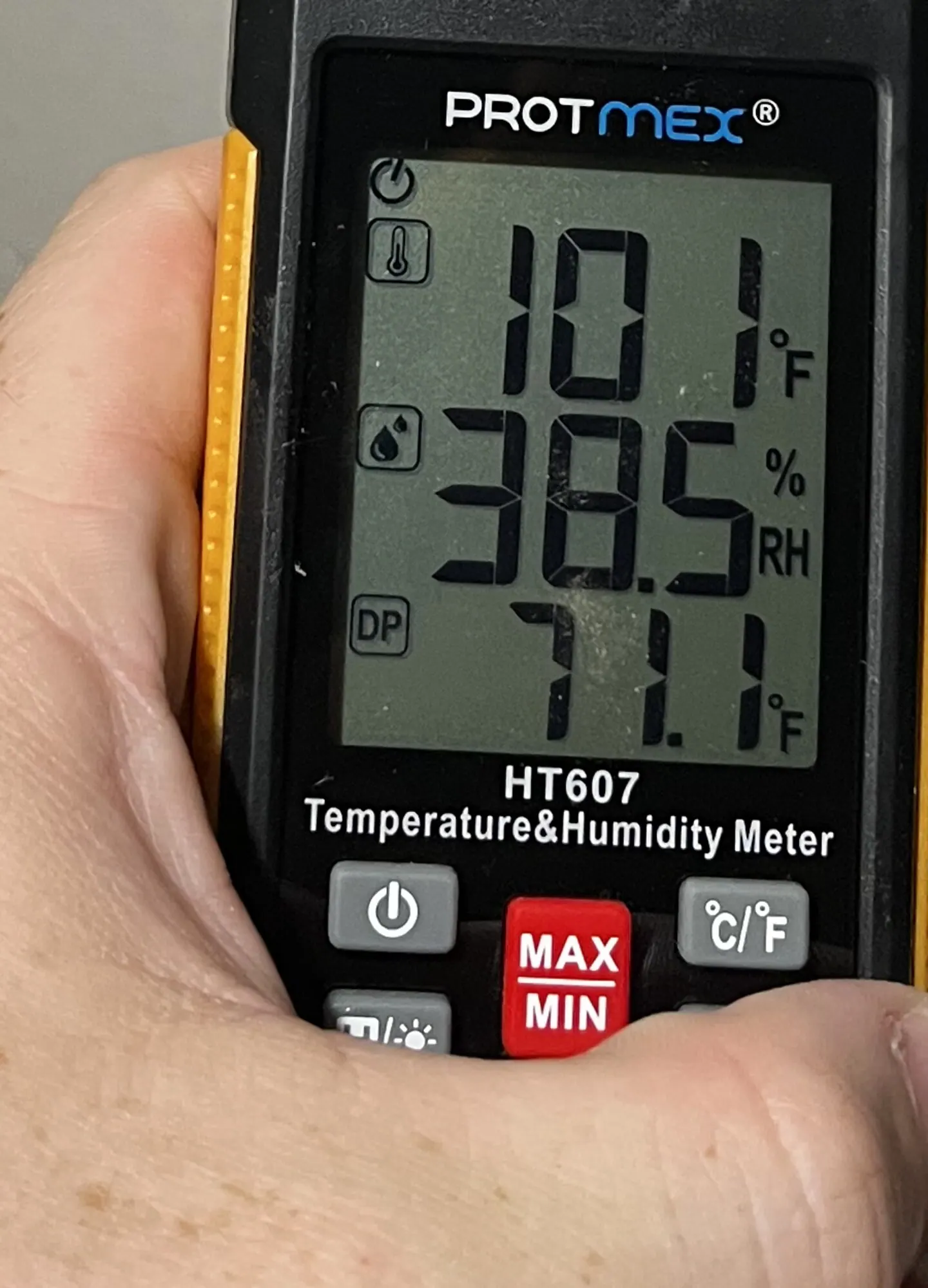 Cropped attic instrument showing 101.1 degrees Fahrenheit and 38.5 percent relative humidity