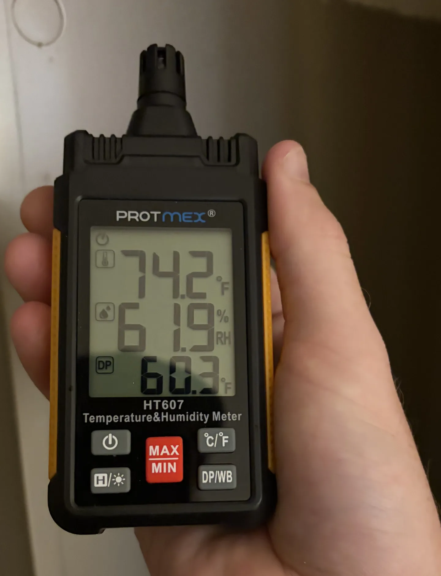 Bedroom meter displaying 74.2 degrees Fahrenheit, 61.9 percent relative humidity and a 60.3 degree Fahrenheit dew point