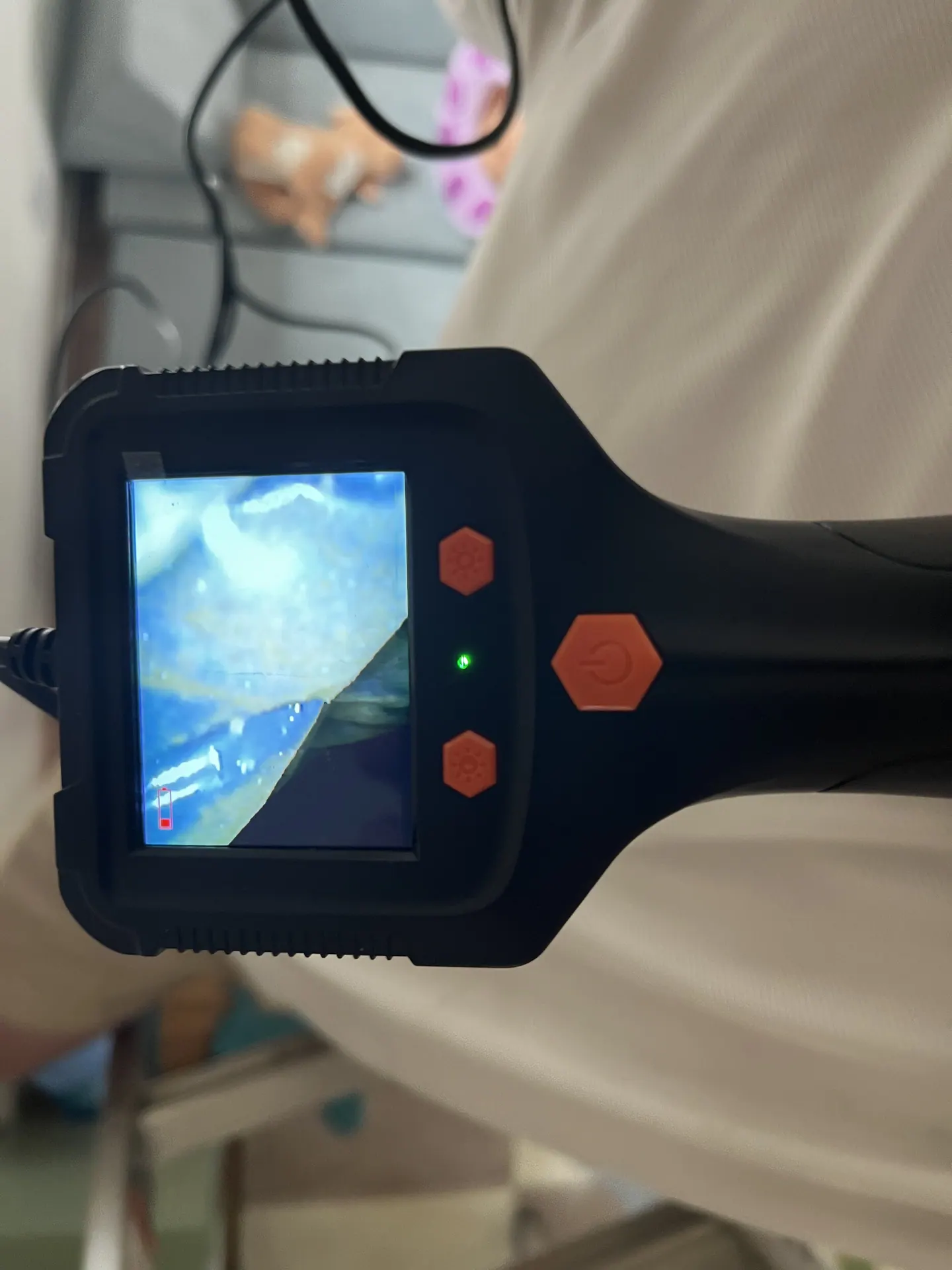 Borescope display during inspection through the right playroom supply grill