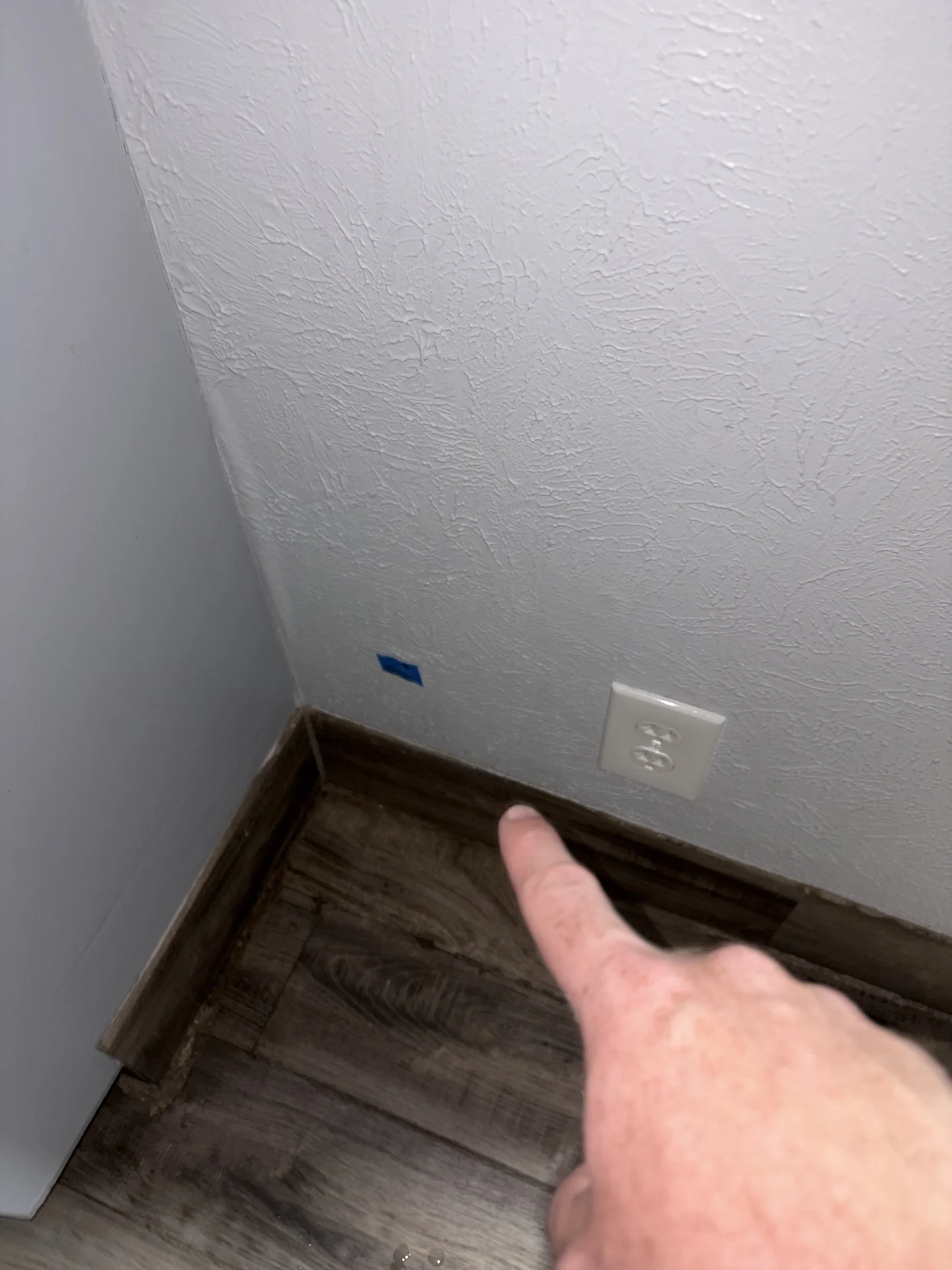 Wall-cavity mold sampling location in commercial exam room