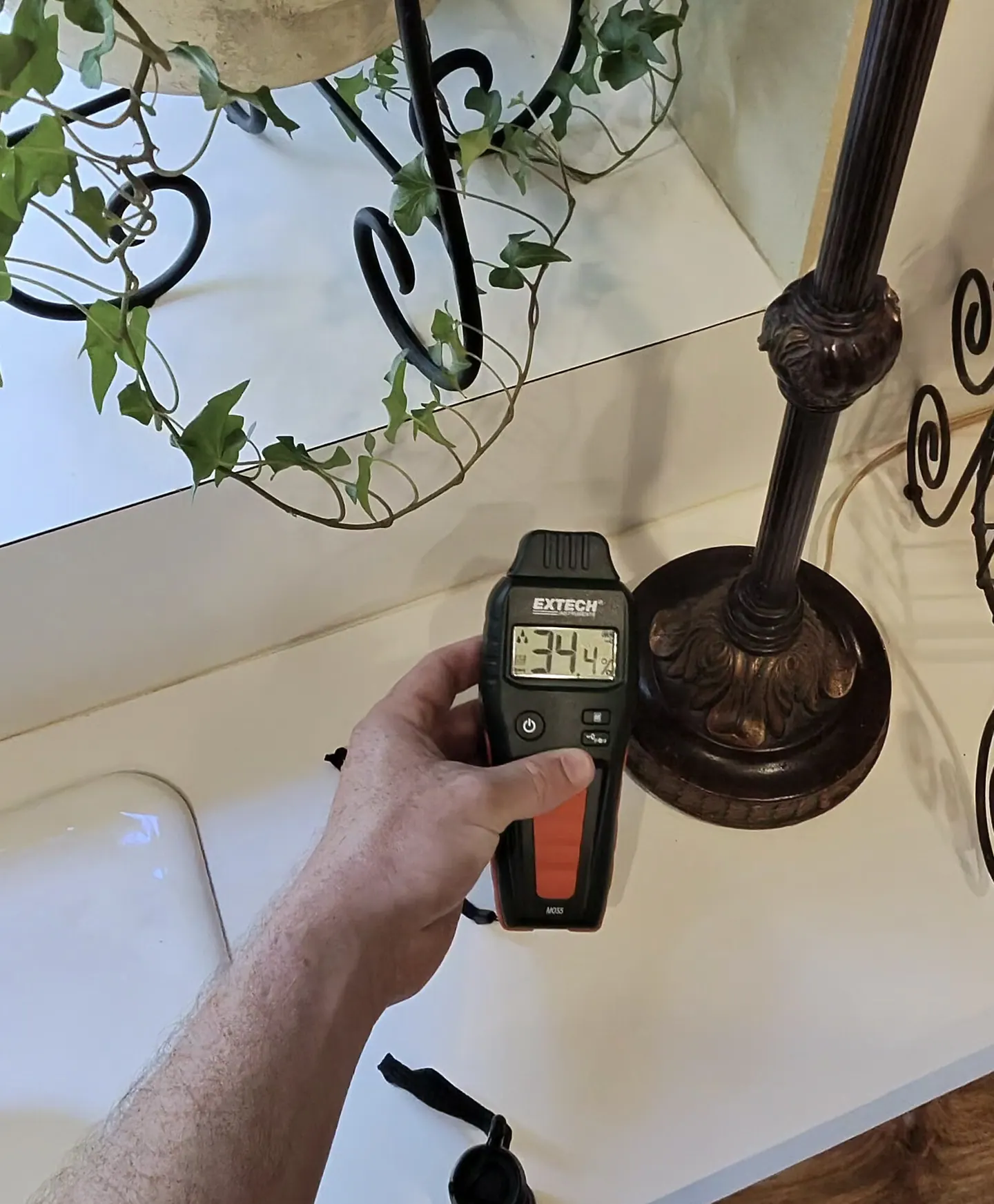 Instrument showing a 34.4 comparative moisture response at the kitchen windowsill