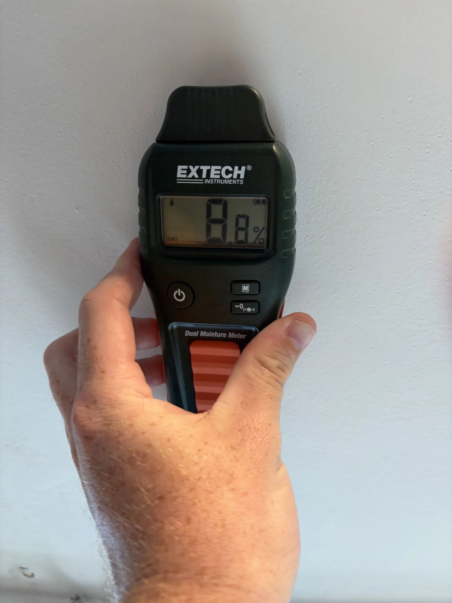 Comparative pinless reference reading of 8.8 away from the ceiling HVAC leak