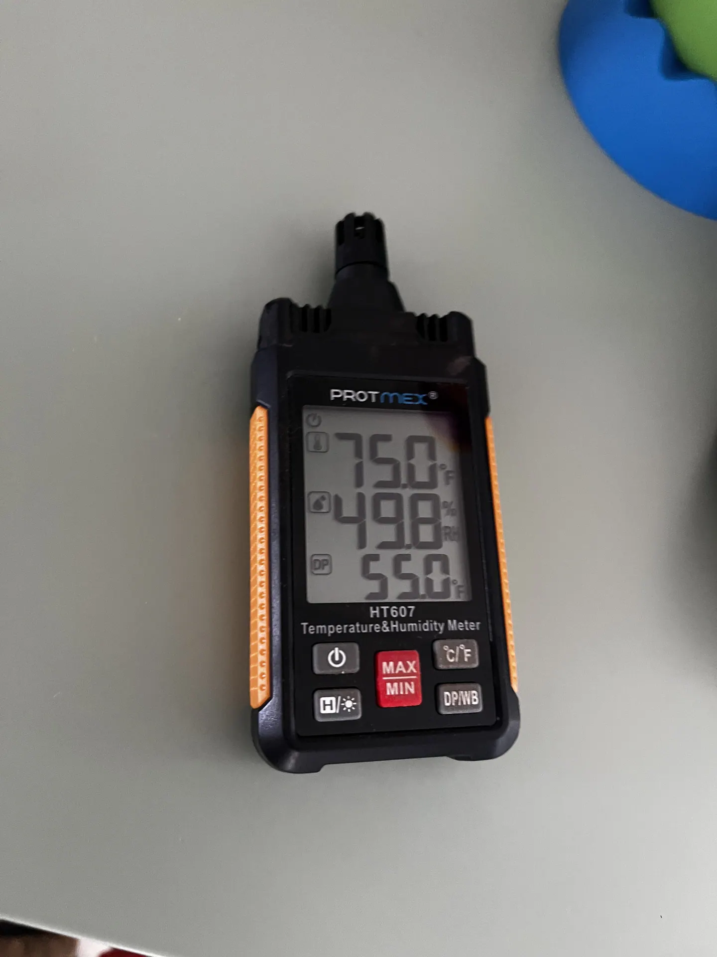 Indoor instrument showing 75.0 degrees Fahrenheit and 49.8 percent relative humidity