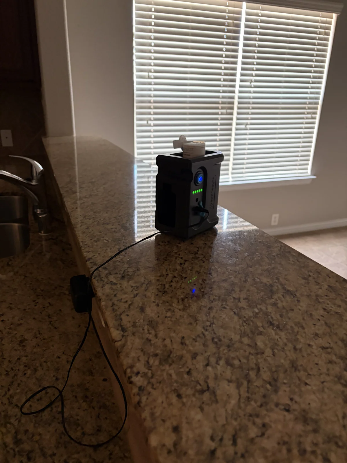 Mold air sampling in main living area during Grand Prairie assessment