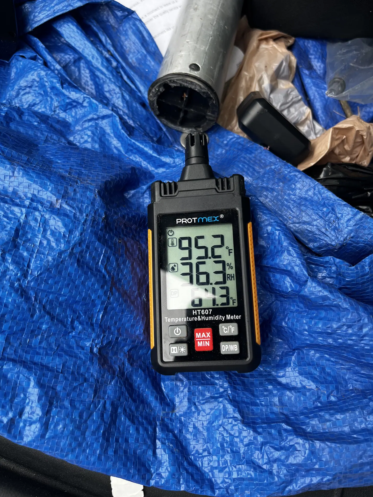 Outdoor instrument showing 95.2 degrees Fahrenheit and 36.3 percent relative humidity
