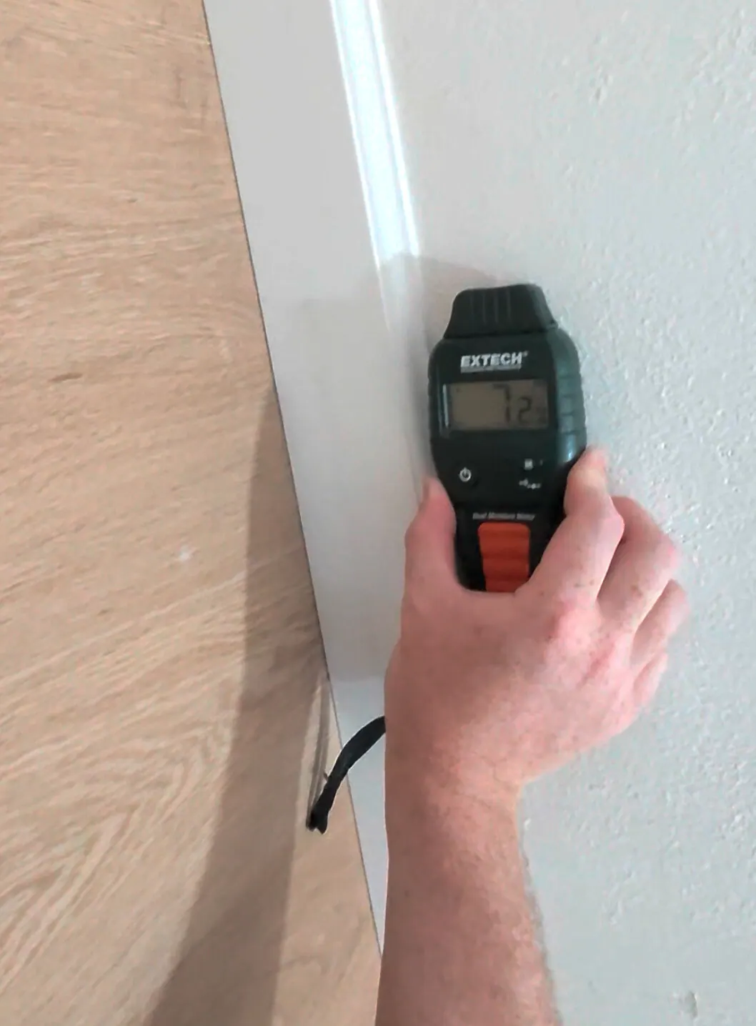 Reference comparative moisture response of 7.2 on unaffected drywall of the same material type